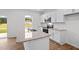 Kitchen island with granite countertops and stainless steel sink at 7549 Michelle Rd, Rocky Mount, NC 27803