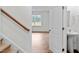 Stairs leading to the second floor with a half bath at 7549 Michelle Rd, Rocky Mount, NC 27803