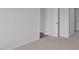 Bright bedroom with an open door to hallway at 7586 Michelle Rd, Rocky Mount, NC 27803