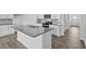 Modern kitchen with granite island and stainless steel appliances at 7586 Michelle Rd, Rocky Mount, NC 27803