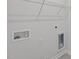 Laundry room with wire shelving, built-in cabinets, and electrical outlets at 7586 Michelle Rd, Rocky Mount, NC 27803