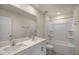 Bathroom boasts double vanity, shower, and bathtub at 7622 Michelle Rd, Rocky Mount, NC 27803
