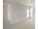 Spacious bedroom with carpeted floor and access to another room at 7622 Michelle Rd, Rocky Mount, NC 27803