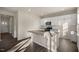 Open concept kitchen with island and hardwood floors at 7622 Michelle Rd, Rocky Mount, NC 27803