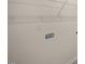 Laundry room with utility hookups and shelving at 7622 Michelle Rd, Rocky Mount, NC 27803
