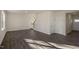 Living area with hardwood floors and access to stairs at 7622 Michelle Rd, Rocky Mount, NC 27803