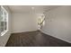 Living room with wood-look flooring and staircase at 7622 Michelle Rd, Rocky Mount, NC 27803