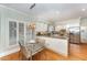 Kitchen features white cabinets, granite countertops, and stainless steel appliances at 81523 Alexander, Chapel Hill, NC 27517