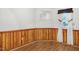 Cozy dining area with wood paneled walls and tile floors at 102 S 2Nd St, Micro, NC 27555