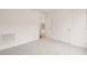 Bright bedroom with grey carpet, double closets and access to hallway at 108 N Woodshed Ct, Cary, NC 27513