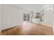 View of dining area and kitchen with access to deck at 108 N Woodshed Ct, Cary, NC 27513
