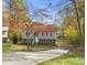 Front view of two-story house with driveway and landscaping at 108 N Woodshed Ct, Cary, NC 27513