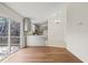 Updated kitchen with gray cabinets, quartz countertops, and stainless steel appliances at 108 N Woodshed Ct, Cary, NC 27513