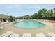 Community pool with surrounding lounge chairs at 113 Durants Neck Ln, Morrisville, NC 27560