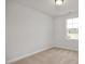 Simple bedroom with carpet and large window at 133 Fairwinds Dr, Lillington, NC 27546