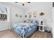 Bedroom with white metal bed frame and blue bedding at 146 Clear Water Rd, Louisburg, NC 27549