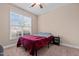 Simple bedroom with a double bed and large window at 146 Trenton Pl, Cameron, NC 28326