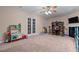 Playroom with toys, table, and fireplace at 146 Trenton Pl, Cameron, NC 28326