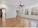 Spacious Gathering room with hardwood floors and wall of windows at 174 Craig Hill Ln, Chapel Hill, NC 27516