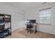 Bright bedroom with built-in shelving and workspace at 1925 Serenade Cir, Raleigh, NC 27610