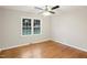 Spacious bedroom with hardwood floors and large windows at 2112 Eastwood Dr, Durham, NC 27703