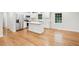 Modern kitchen featuring white cabinets, stainless steel appliances, and an island at 2112 Eastwood Dr, Durham, NC 27703