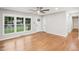 Bright living room with hardwood floors and lots of natural light at 2112 Eastwood Dr, Durham, NC 27703