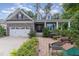 House exterior featuring stone facade and walkway at 2421 Beckwith Rd, Apex, NC 27523