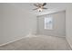 Bright bedroom with ceiling fan and window coverings at 303 Old Castle Dr, Morrisville, NC 27560