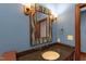 Bathroom boasts granite countertop and mosaic mirror at 3240 Hillcastle Trl, Chapel Hill, NC 27516