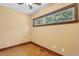 Spacious bedroom with hardwood floors and a window at 3240 Hillcastle Trl, Chapel Hill, NC 27516