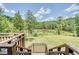 Deck steps down to a scenic backyard at 3240 Hillcastle Trl, Chapel Hill, NC 27516