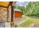 Stone and red house exterior with walkway and landscaping at 3240 Hillcastle Trl, Chapel Hill, NC 27516