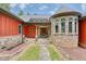 Stone and red house exterior with walkway and landscaping at 3240 Hillcastle Trl, Chapel Hill, NC 27516