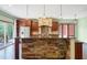 Spacious kitchen with granite countertops and island at 3240 Hillcastle Trl, Chapel Hill, NC 27516