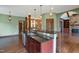 Open kitchen with large island and breakfast bar at 3240 Hillcastle Trl, Chapel Hill, NC 27516