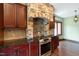 Kitchen with granite countertops and stone backsplash at 3240 Hillcastle Trl, Chapel Hill, NC 27516