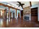 Living room with hardwood floors, fireplace, and high ceilings at 3240 Hillcastle Trl, Chapel Hill, NC 27516