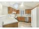 Kitchen with wood cabinets, stainless steel appliances, and an island at 3311 Long Ridge Rd, Durham, NC 27703