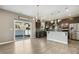 Modern kitchen with dark cabinetry, granite countertops and breakfast bar at 3341 Sandy Meadow Dr Dr, Fuquay Varina, NC 27526