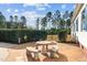 Relaxing patio with stone table and benches, perfect for outdoor dining at 3450 Leaflet Church Rd, Broadway, NC 27505