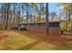 Ranch home with blue siding and brick accents at 3520 Courtland Drive, Durham, NC 27707