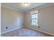 Bright bedroom with neutral walls and carpet flooring at 360 Sandy Ridge Rd, Dunn, NC 28334