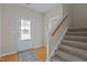 Bright entryway with hardwood floors and a view of the stairs at 516 Gumview Cir, Fuquay Varina, NC 27526