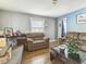 Living room with hardwood floors and a cozy seating area at 114 Barnhill St, Durham, NC 27707