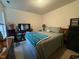 Second bedroom with a queen-size bed and dresser at 1454 Cimarron Pkwy # 17, Wake Forest, NC 27587