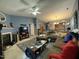 Spacious living room featuring a comfortable sectional sofa and fireplace at 1454 Cimarron Pkwy # 17, Wake Forest, NC 27587