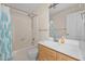 Clean bathroom with a tub shower and wood vanity at 148 Silver Lake Pt Pt, Sanford, NC 27332