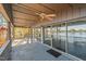 Lakefront deck with sliding glass doors and ceiling fans at 148 Silver Lake Pt Pt, Sanford, NC 27332