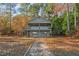 Two-story lakefront home with a walkway and balconies at 148 Silver Lake Pt Pt, Sanford, NC 27332